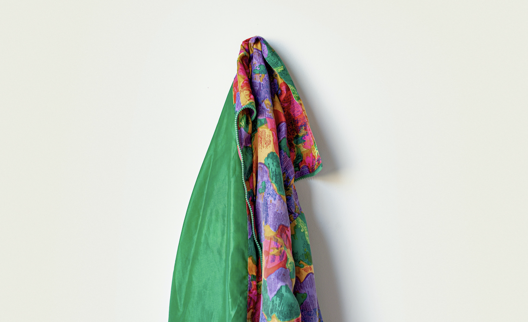 hanging green coat